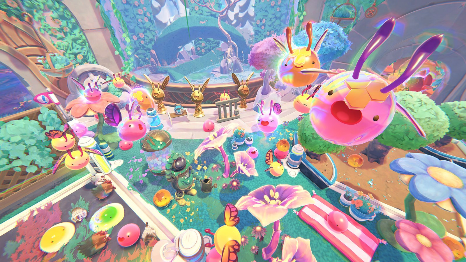 Colorful slimes bouncing around a ranch on Rainbow Island in Slime Rancher 2